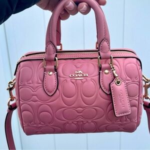 Coach Pink Satchel with Signature Embossed Design and Gold Hardware